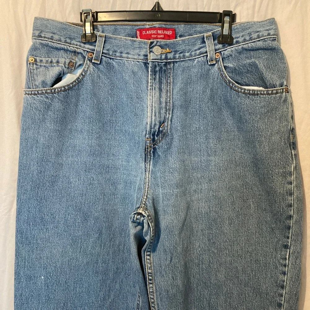 Vintage Levis 550 Classic Relaxed Tapered Jeans Medium Wash Blue Denim 16M y2k